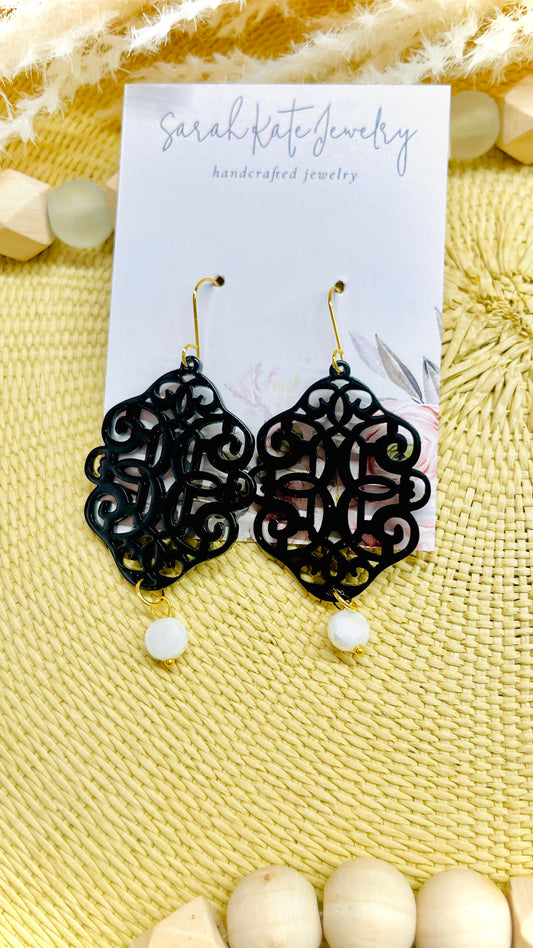 Black Acrylic Filigree White Iridescent Glass Bead Earrings